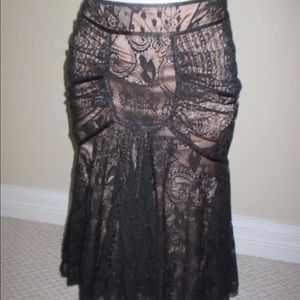 BEBE LACE ASYMMETRICAL HI LOW SKIRT SIZE 6